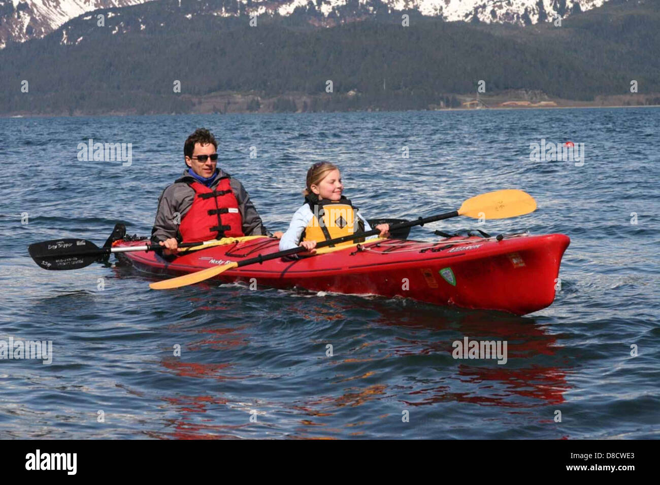 Man and girl in kayak Stock Photo Alamy