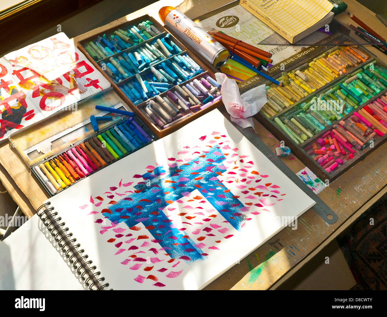 Artist's sketchbook and pastel crayons France Stock Photo Alamy