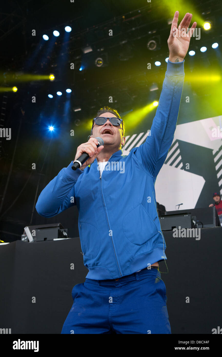 International singing sensation Robbie Williams joined rap star Dizzy Rascal on stage at the Radio1's One Big Weekend in Derry, Londonderry. Stock Photo