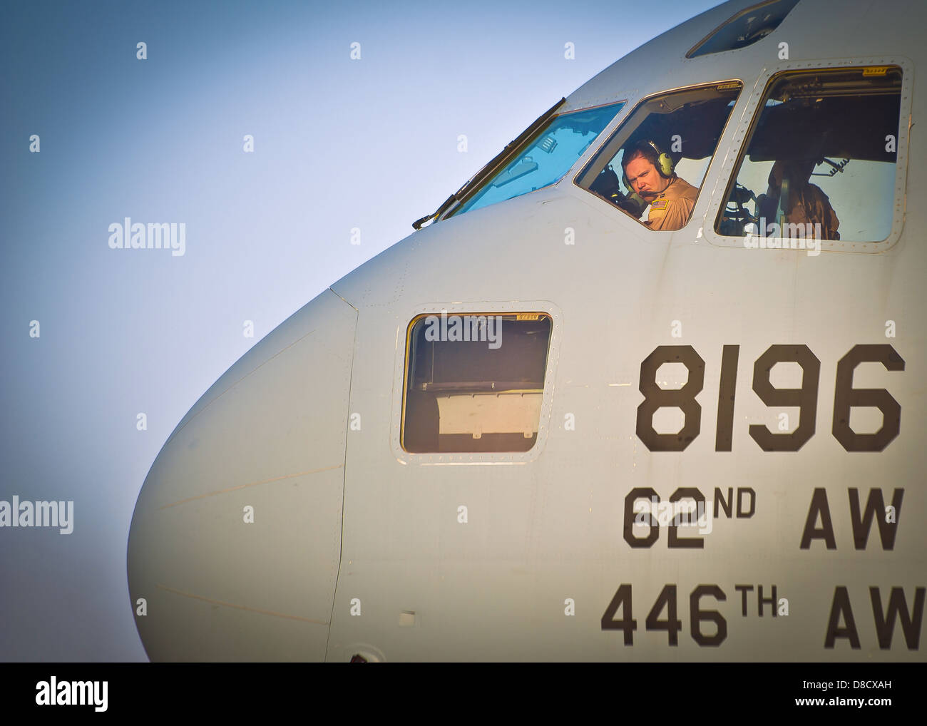 A US Air Force pilot performs pre-flight checks on a C-17 Globemaster III aircraft before departing Shindand Air Base May 14, 2013 in Sabzwar, Afghanistan. Stock Photo