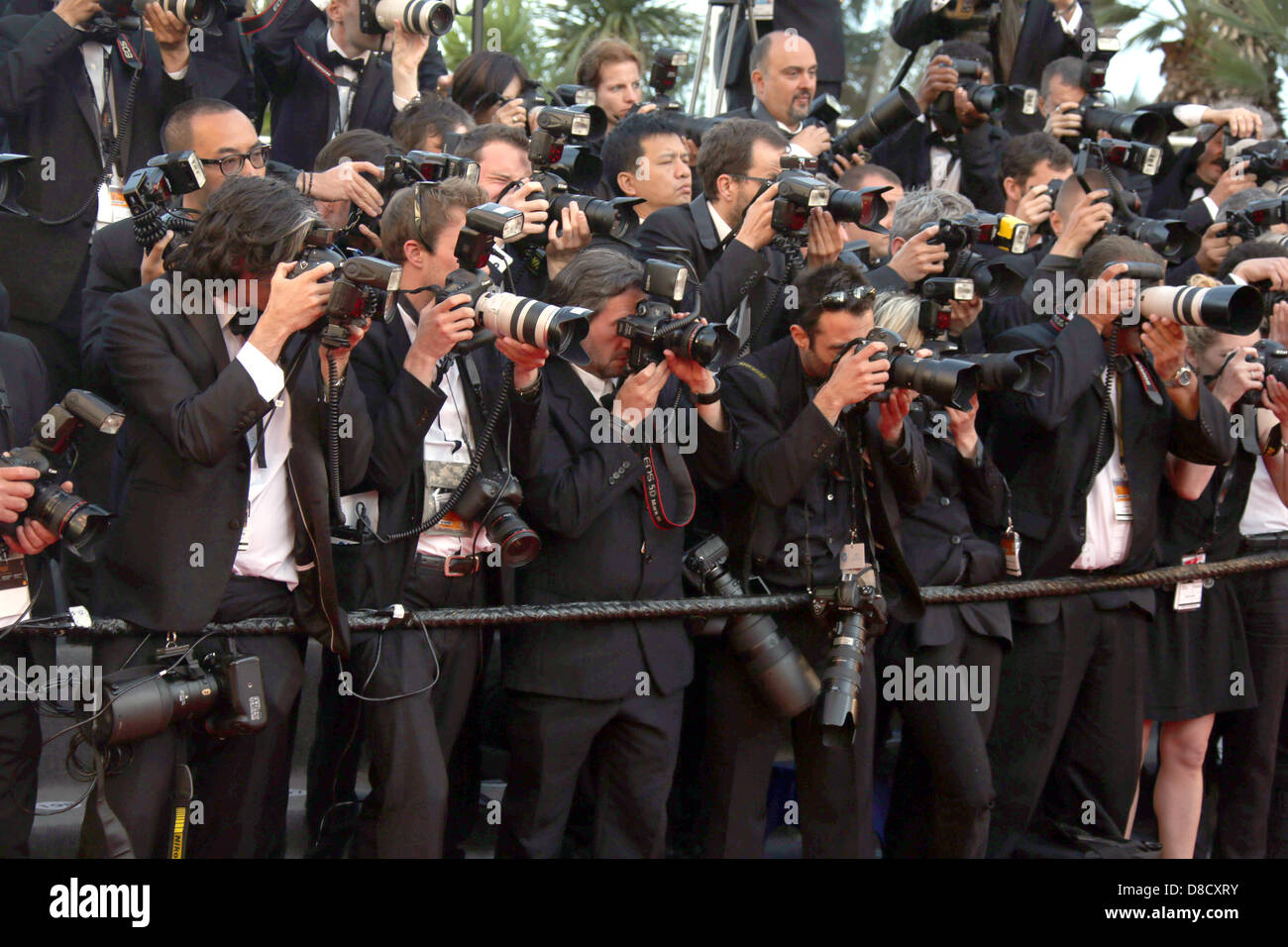 Photographers working at the premiere of 'The Immigrant' during the the 66th Cannes International Film Festival at Palais des Festivals in Cannes, France, on 24 May 2013. Photo: Hubert Boesl Stock Photo