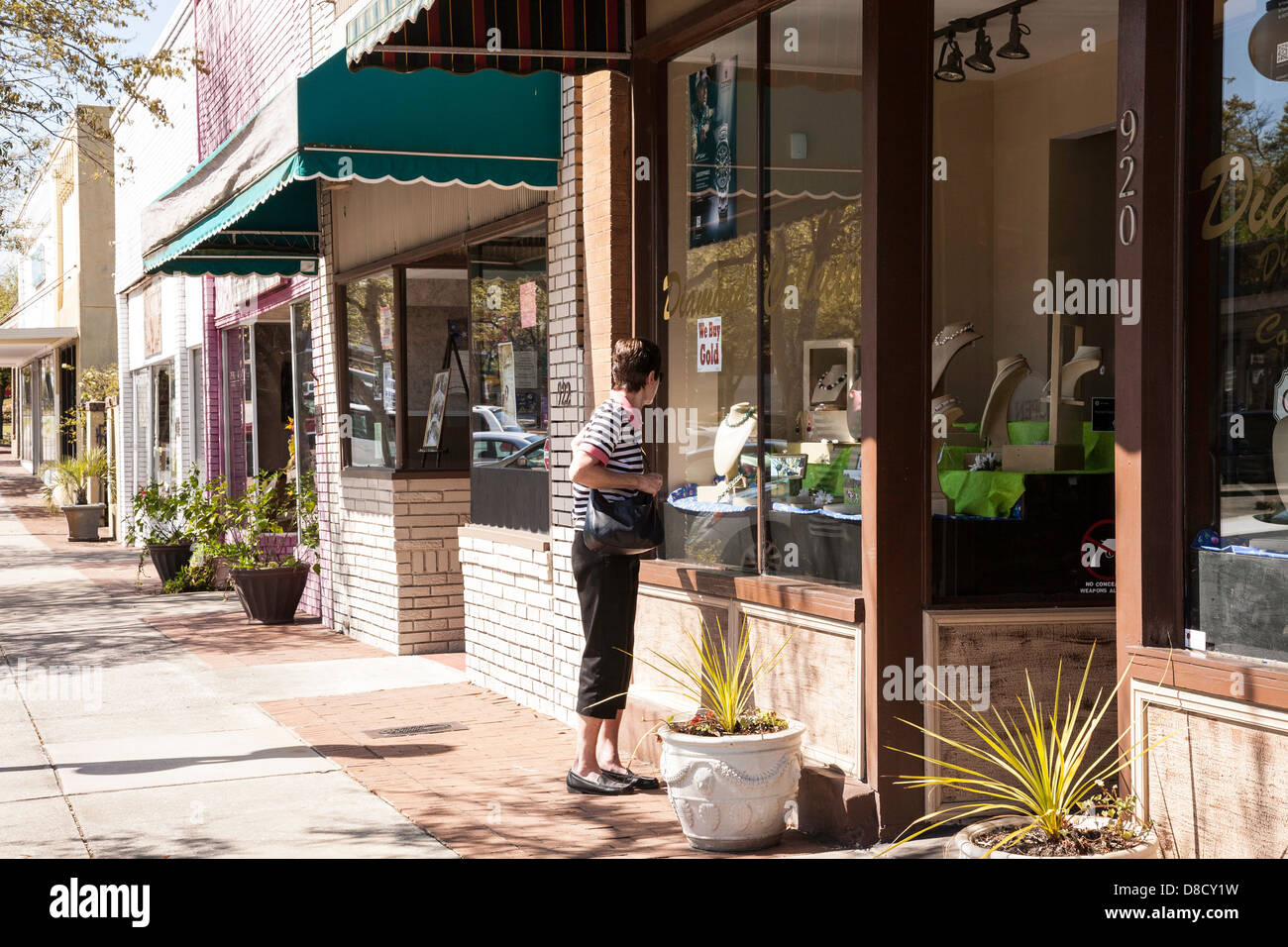 Woman Shopping on Front Street, Historic District, Georgetown, SC Stock Photo