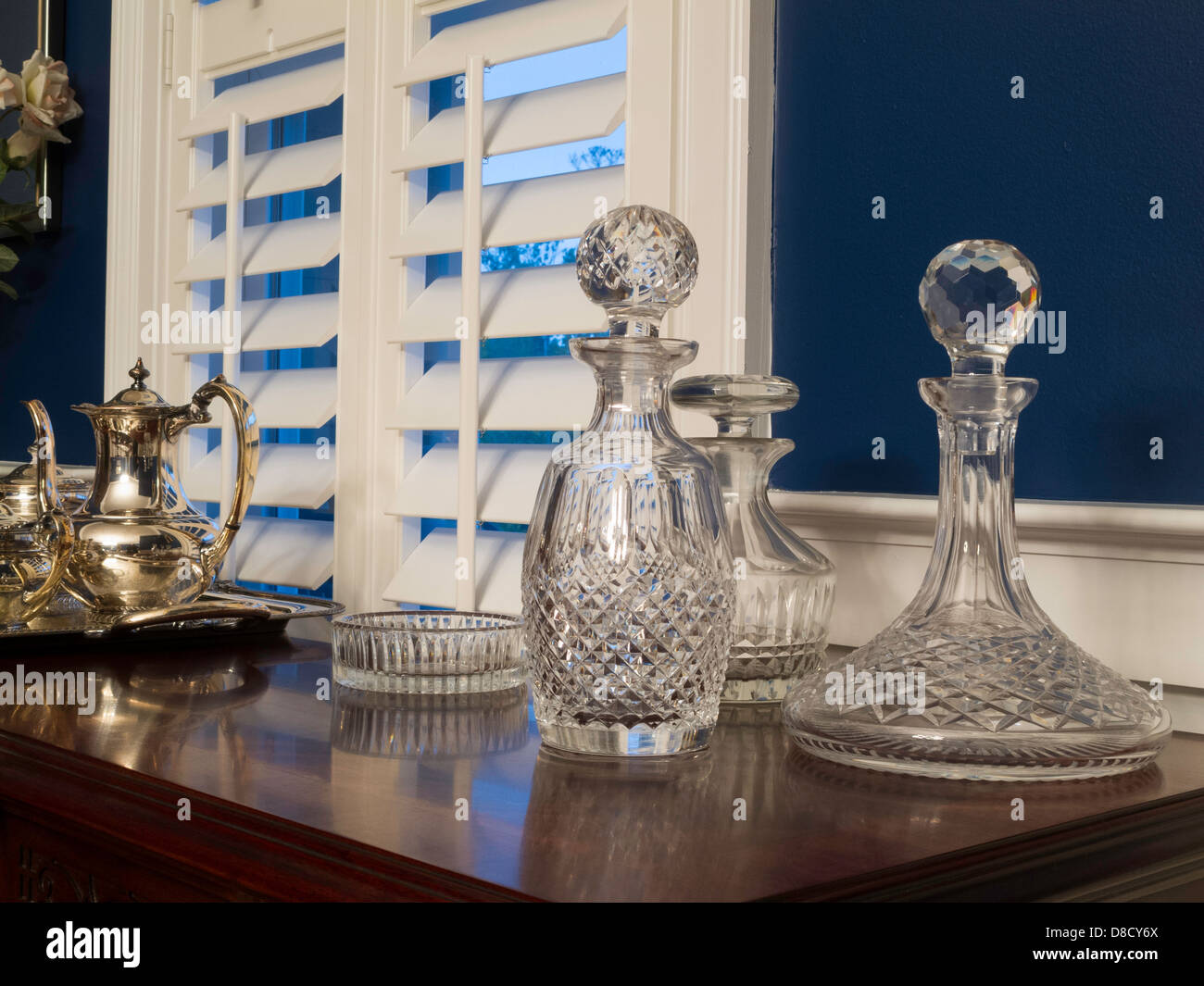 Crystal Decanters on Showcase Dining Room Sideboard, USA Stock Photo