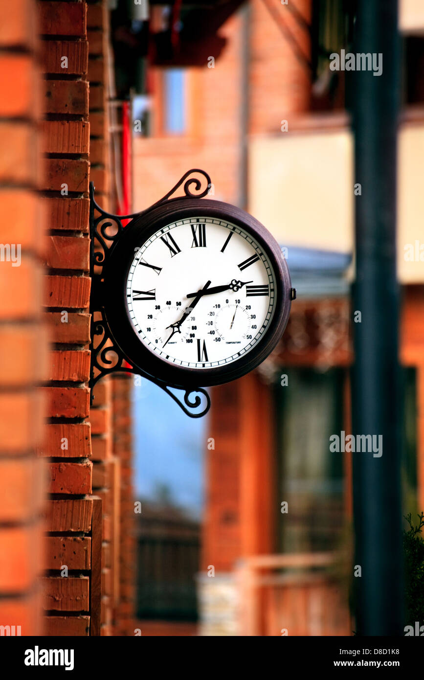old street clock in bulgarian holiday village Stock Photo Alamy