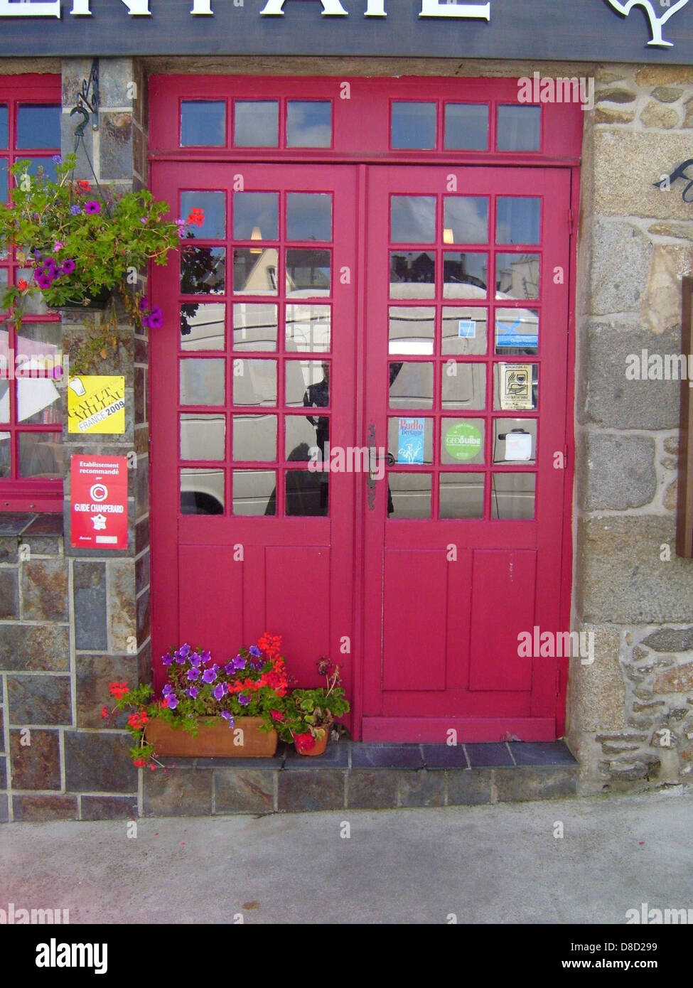 A photograph of an old-fashioned door, with intricate woodwork and ...