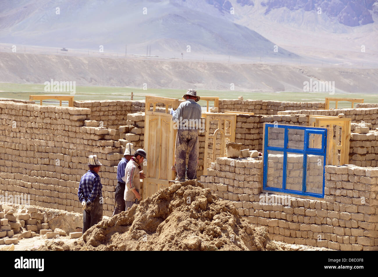 Construction of new house in Murgab by Kyrgyz craftsmen Stock Photo