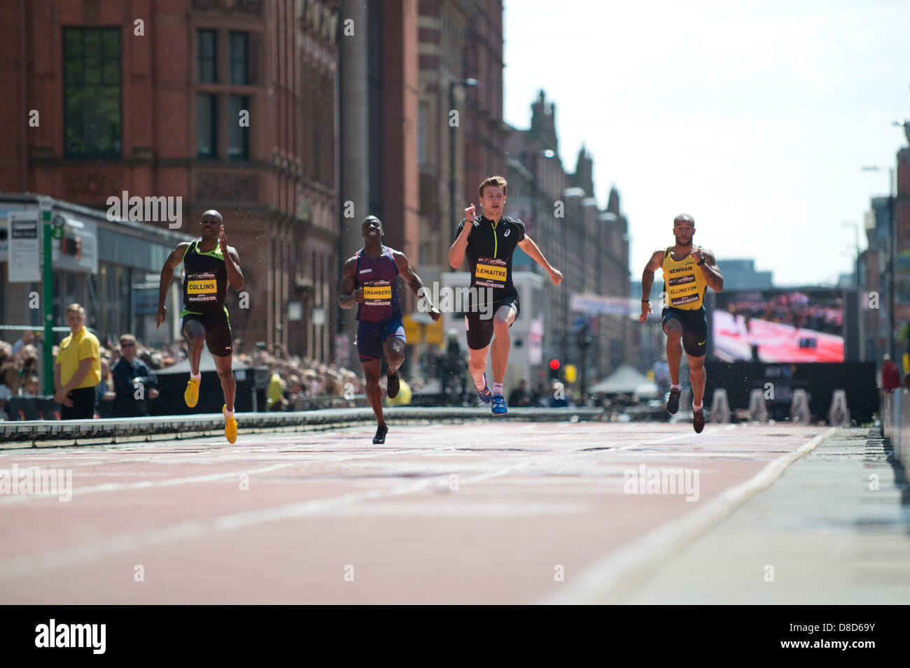 MANCHESTER, UK. 25th May 2013. Christophe Lemaitre (second right) of France sprints to take 1st place during the Mens 150m event in a time of 14.90 which took place on Deansgate in Manchester during the 2013 BT Great CityGames. The current 100m European Champion beat Kim Collins (Saint Kitts and Nevis, 2nd, furthest left), James Ellington (Great Britain, 3rd, furthest right) and Dwain Chambers (Great Britain, 4th, second left). Credit: News Shots North/Alamy Live News (Editorial use only). Stock Photo