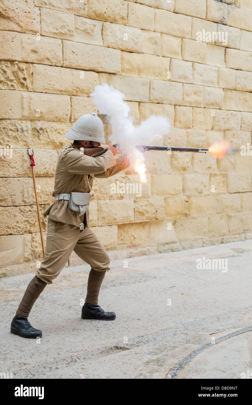Rifle being fired at a Fort Rinella. Tourists are taken on a historic walk through on the progress of rifle technology. Stock Photo