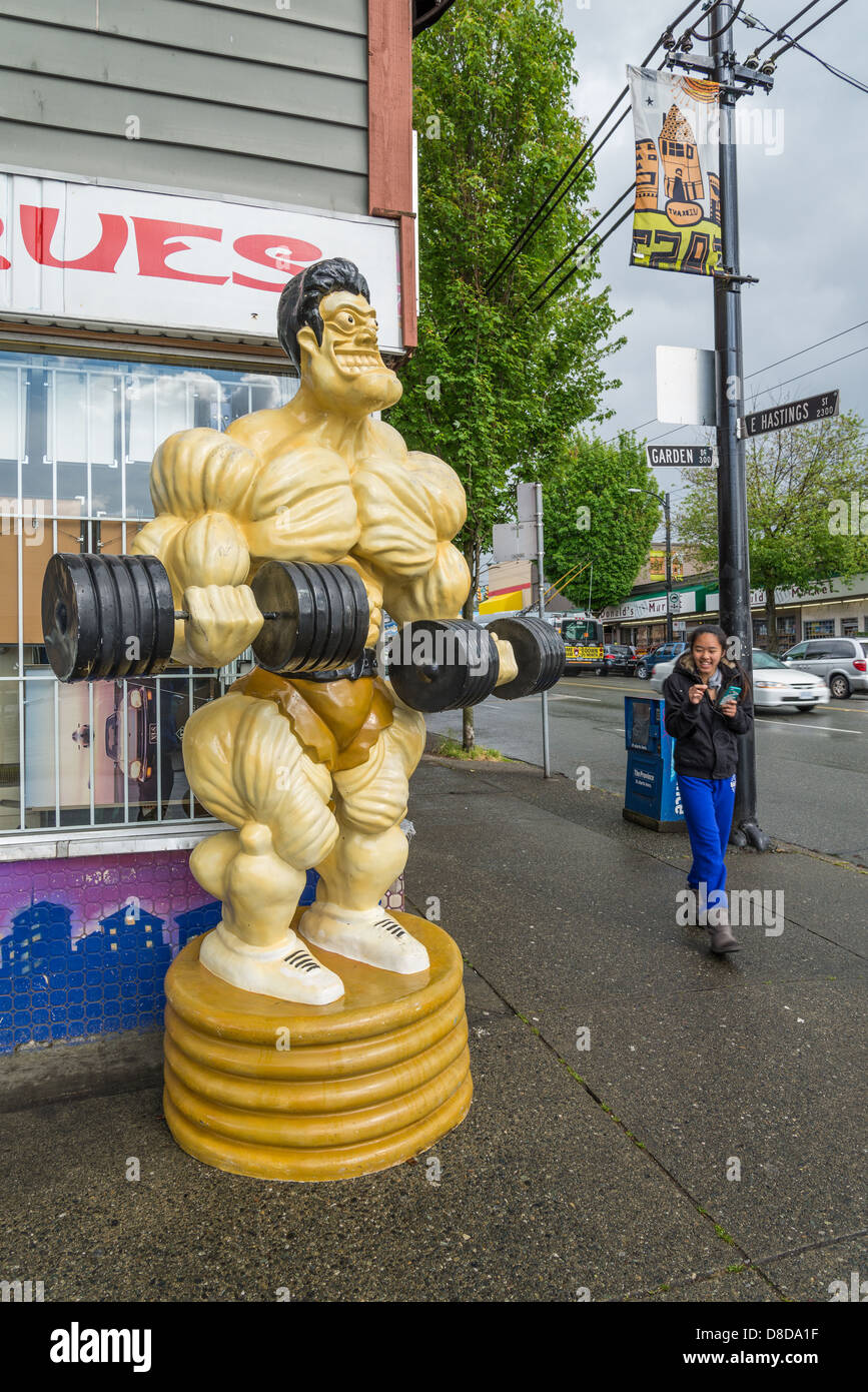 Caricature strongman figure with barbells Stock Photo