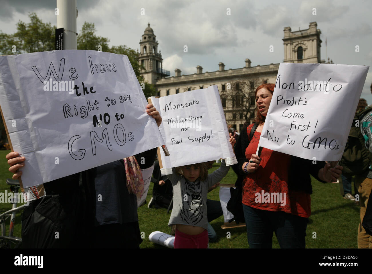 London, UK. 25th May, 2013. Protesters at a demonstration against Monsanto's production of GM food outside  on Parliament Square  Credit:  Mario Mitsis / Alamy Live News Stock Photo
