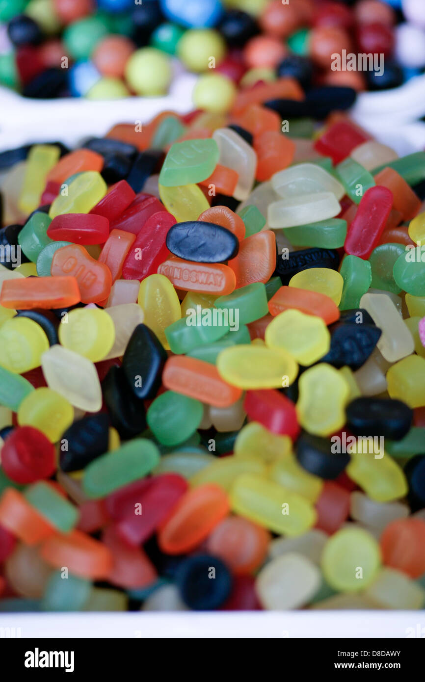 Colorful array of sweets on a market stall Stock Photo - Alamy