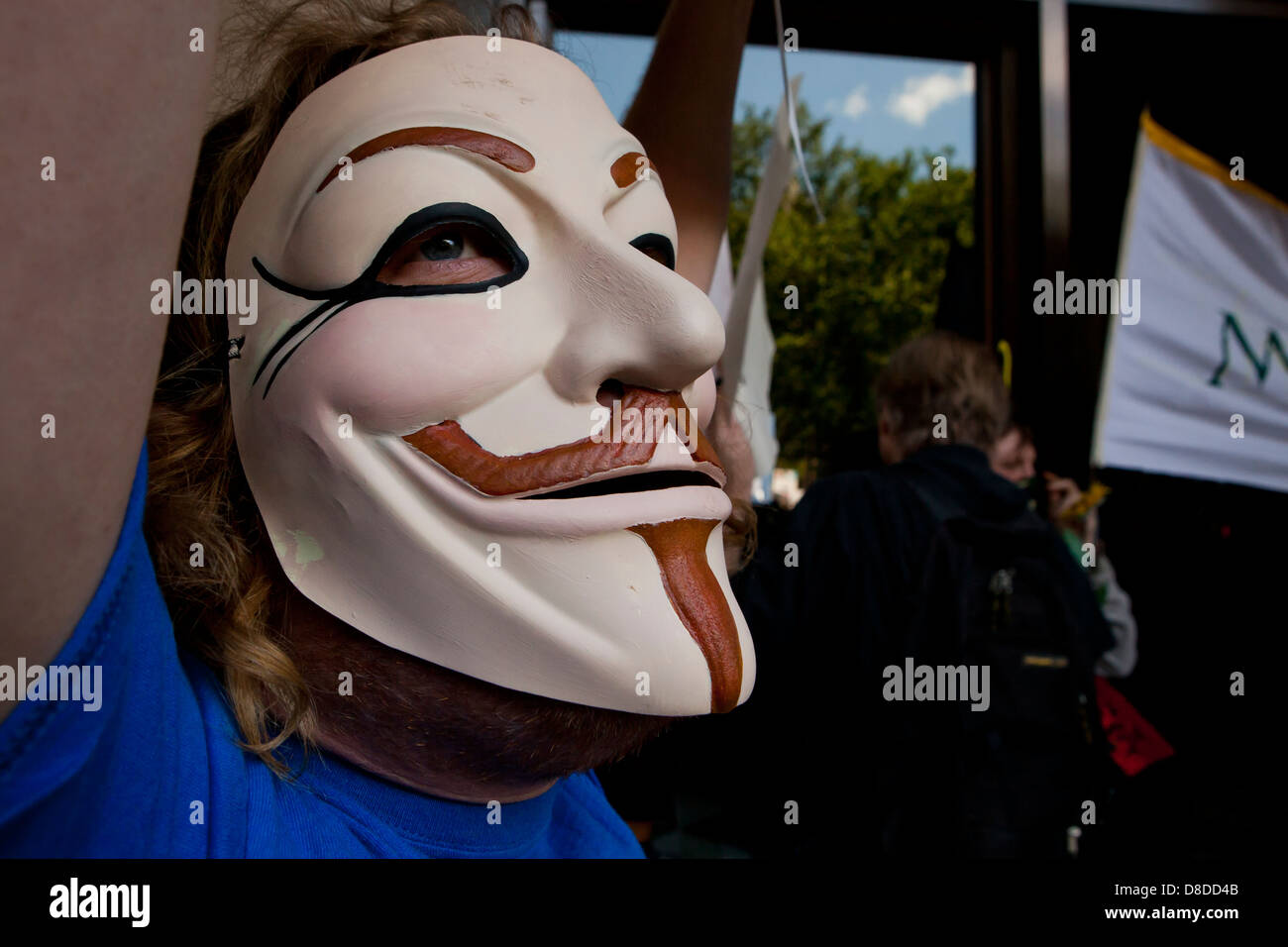 Man wearing a Guy Fawkes mask Stock Photo
