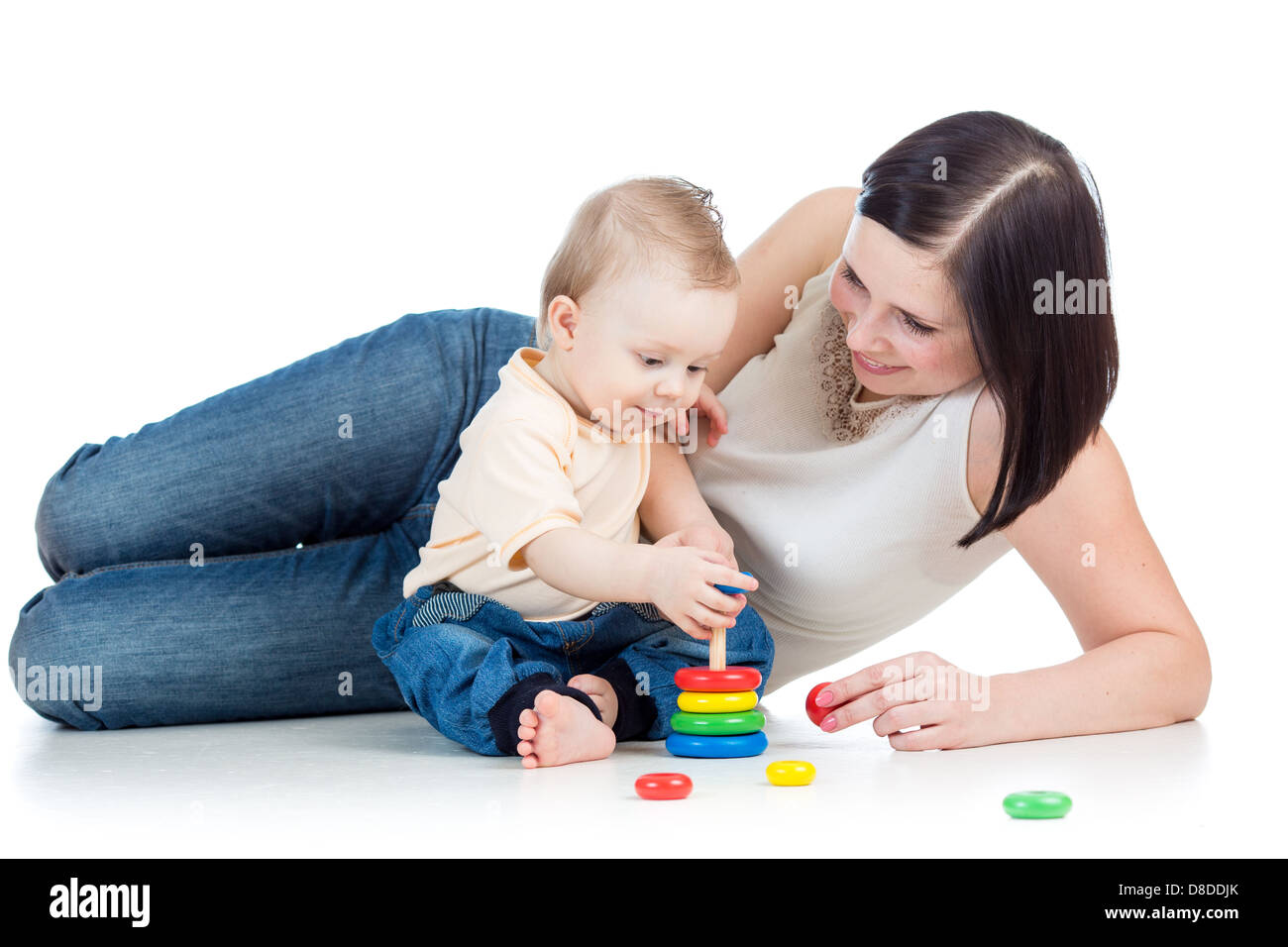 mother and baby play pyramid toy Stock Photo