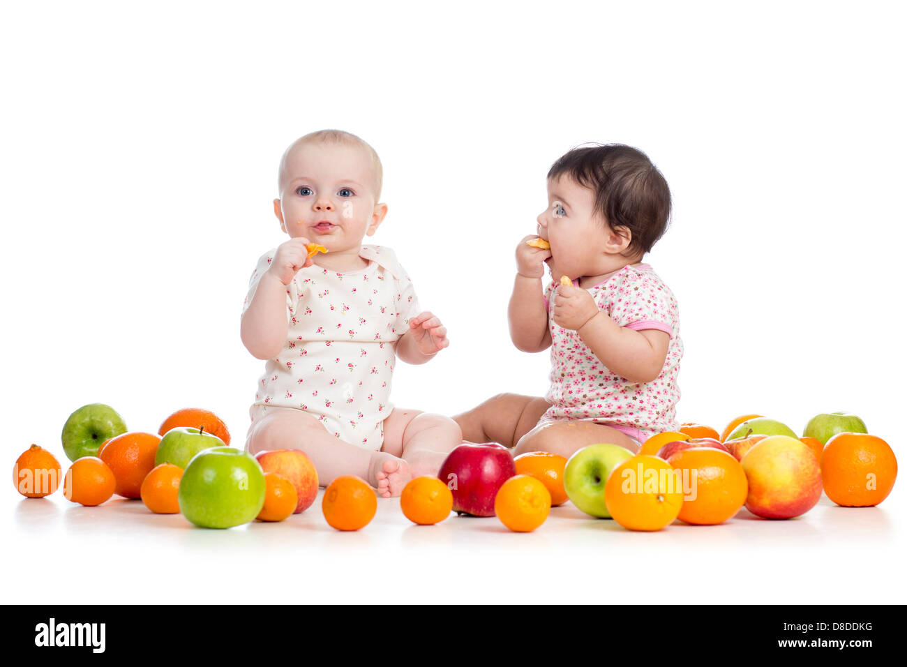 babies eating fruits Stock Photo Alamy