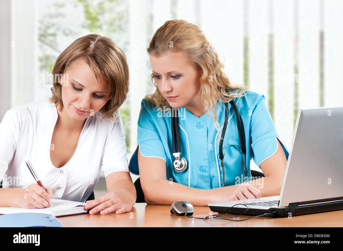 Doctors with laptop Stock Photo Alamy