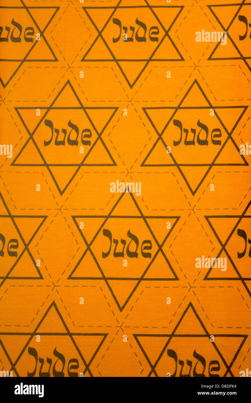 Fabric sheet of Jewish yellow stars with 'Jude' inscription which the Nazis forced Jews to wear Jewish Museum Berlin Germany Stock Photo