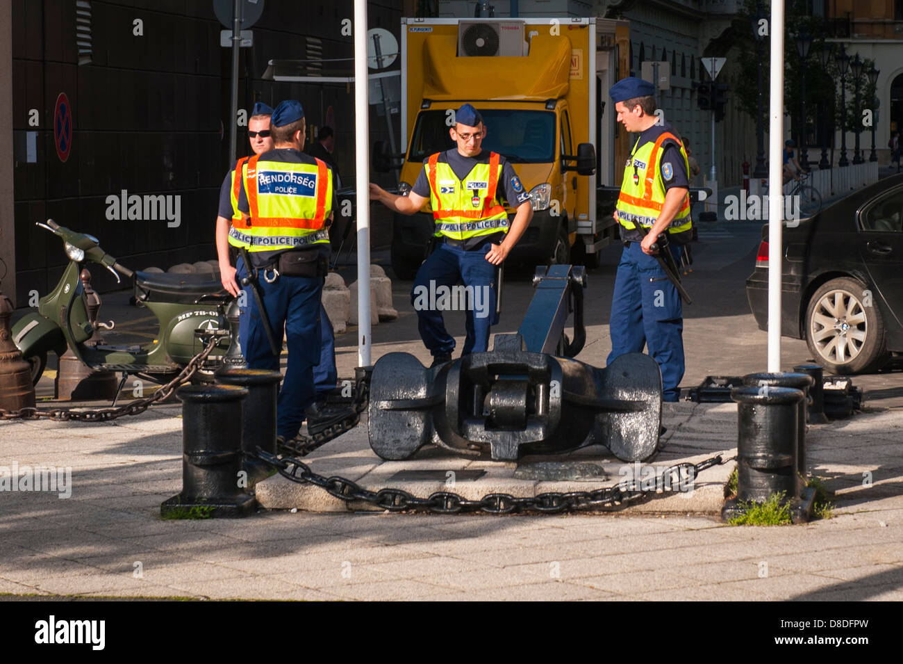 Hungary Budapest Rendorseg police cop cops security guard guards by Intercontinental Hotel for Jewish Convention black ship's anchor uniform scooter Stock Photo