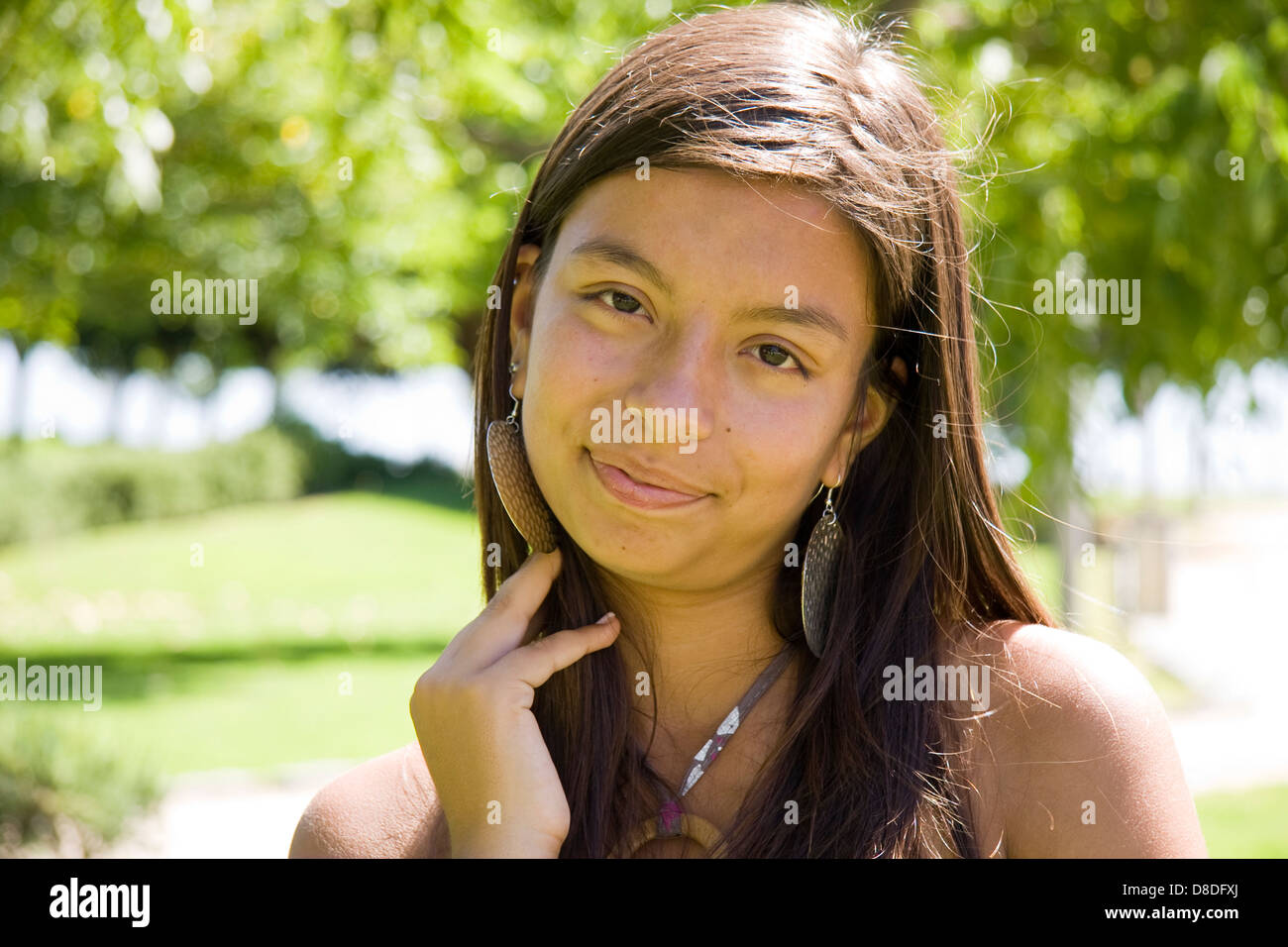Portrait of a young girl on the park Stock Photo - Alamy