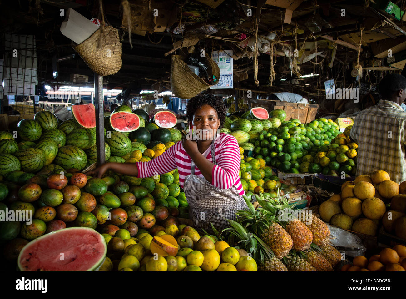 nairobi kenya woman market water melons pineapples Stock Photo Alamy