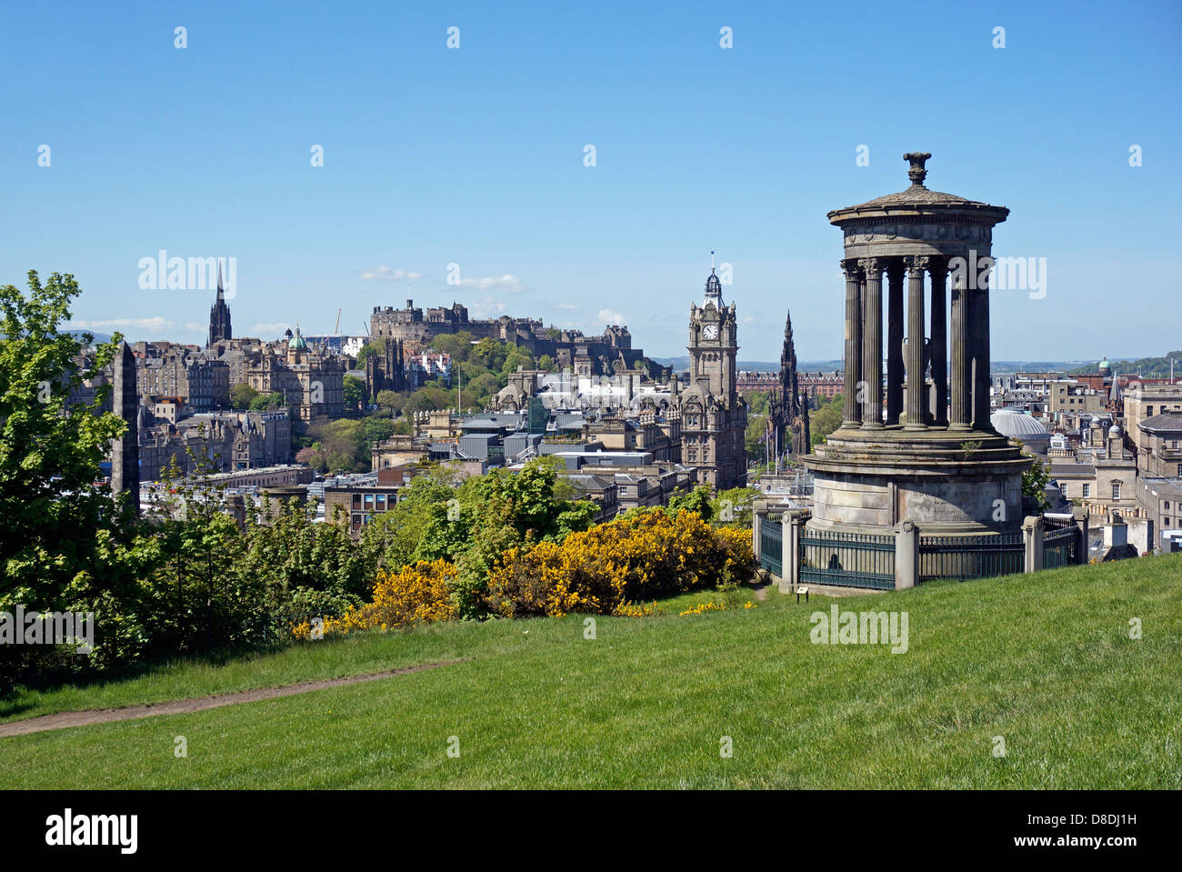 The classic view of the centre of Edinburgh from Calton Hill with Dugald Stewart Memorial right Stock Photo