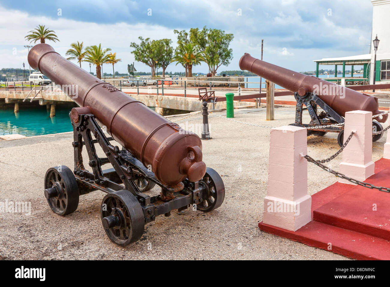 Very old canons sitting on the main square of St. George's, Bermuda Stock Photo