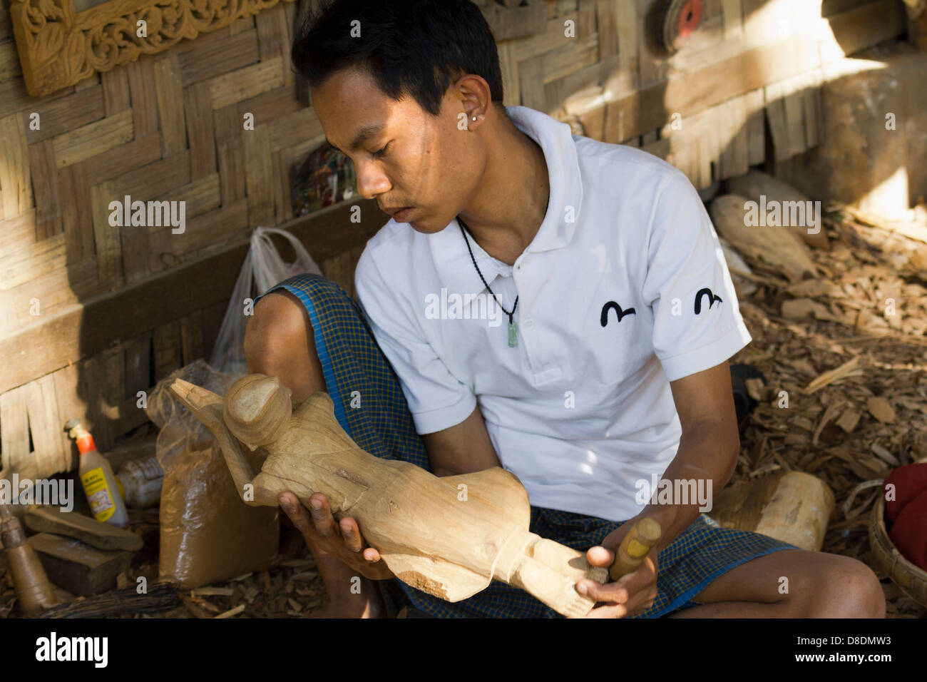 Carving Burmese marionettes in Mandalay, Myanmar 7 Stock Photo