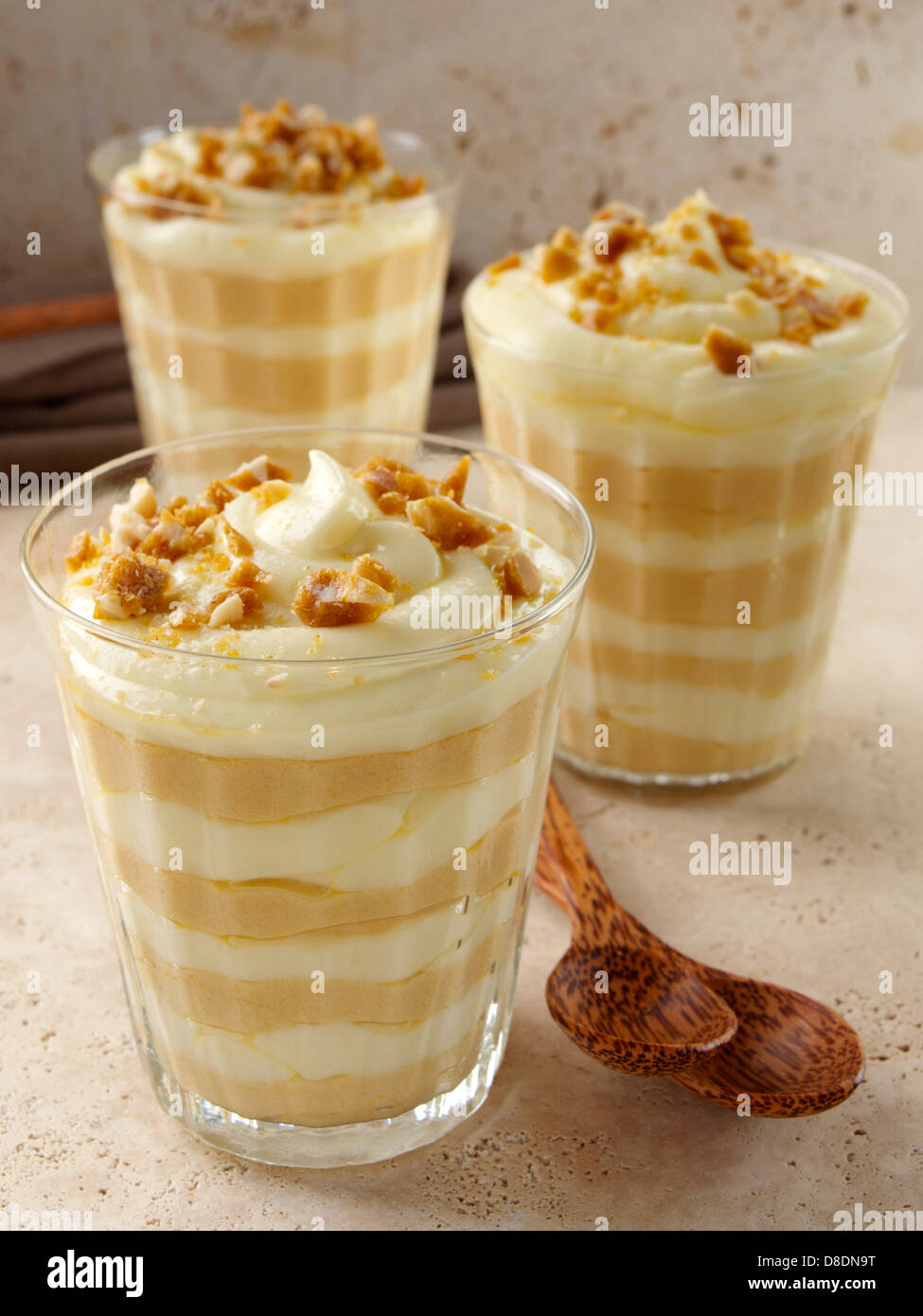 Brittle topped Vanilla butterscotch pudding parfaits Stock Photo Alamy