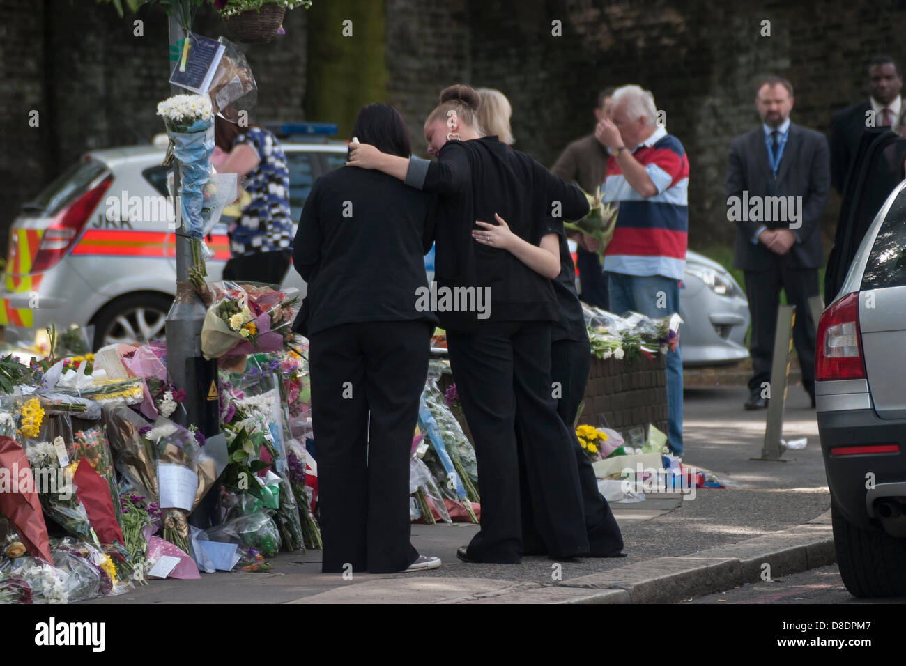 London, UK. 26th May, 2013. Members of murdered soldier Drummer Lee ...