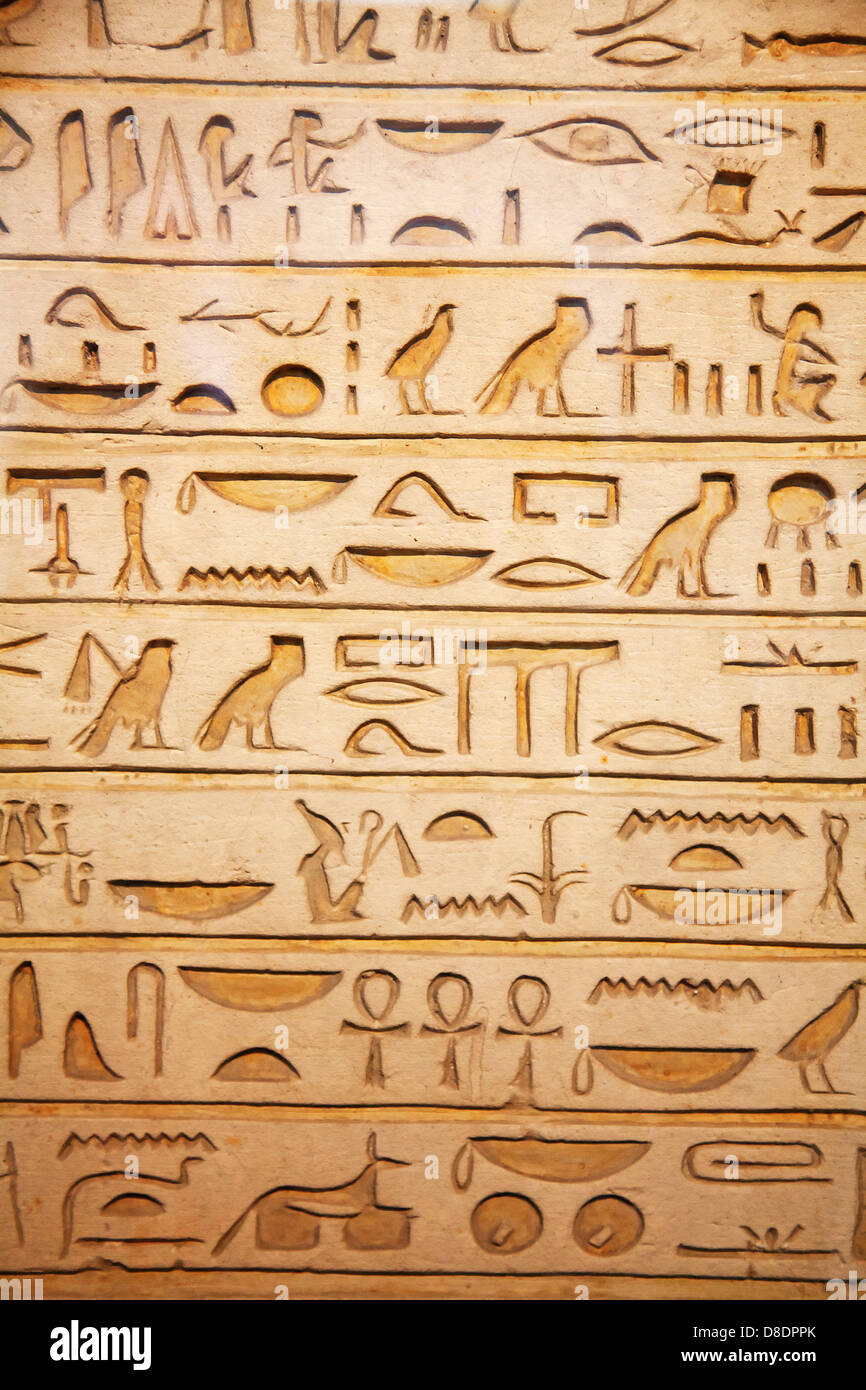 old egypt hieroglyphs carved on the stone Stock Photo - Alamy