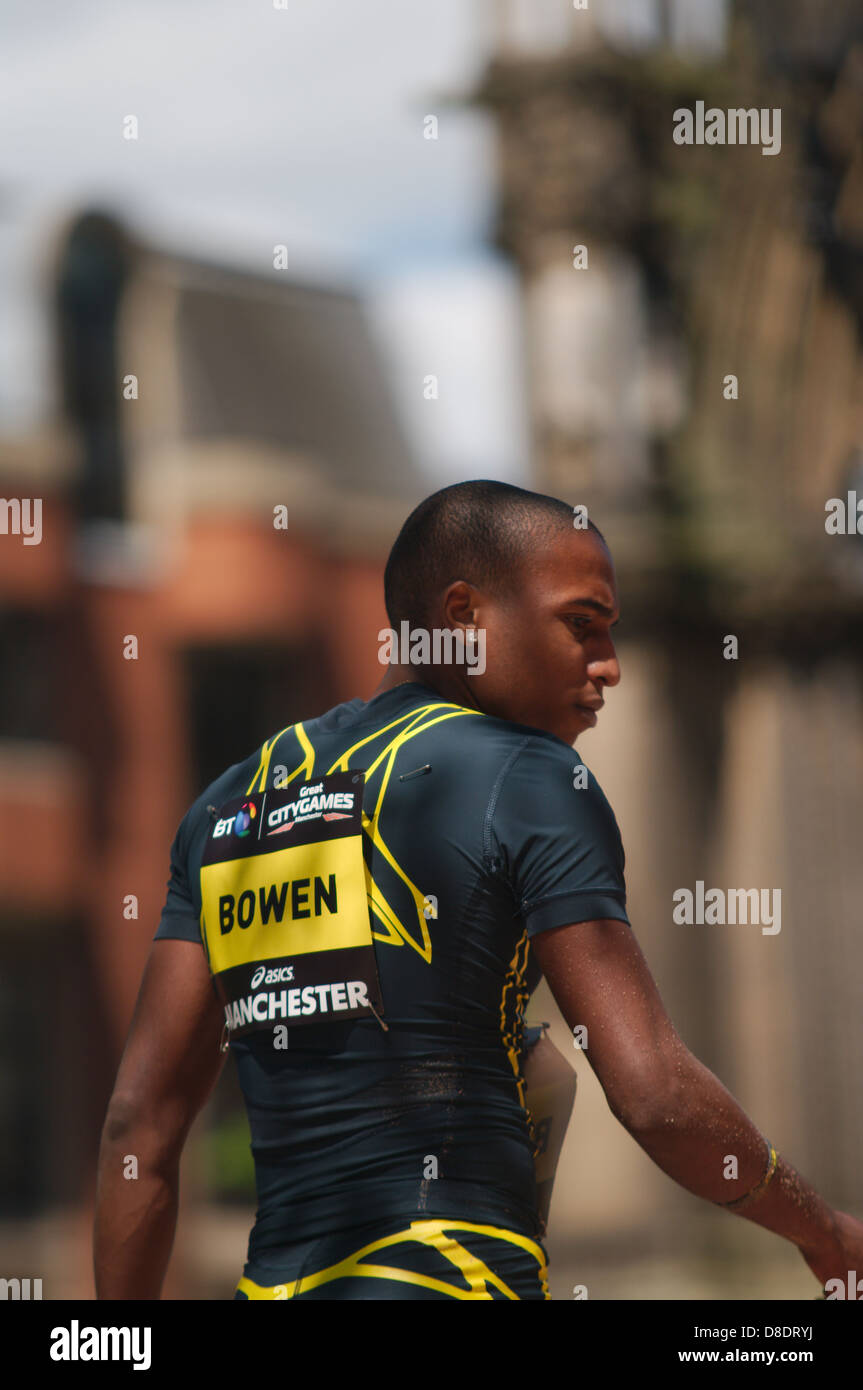 Jhamal Bowen of Panama looking at his landing after jumping in the long