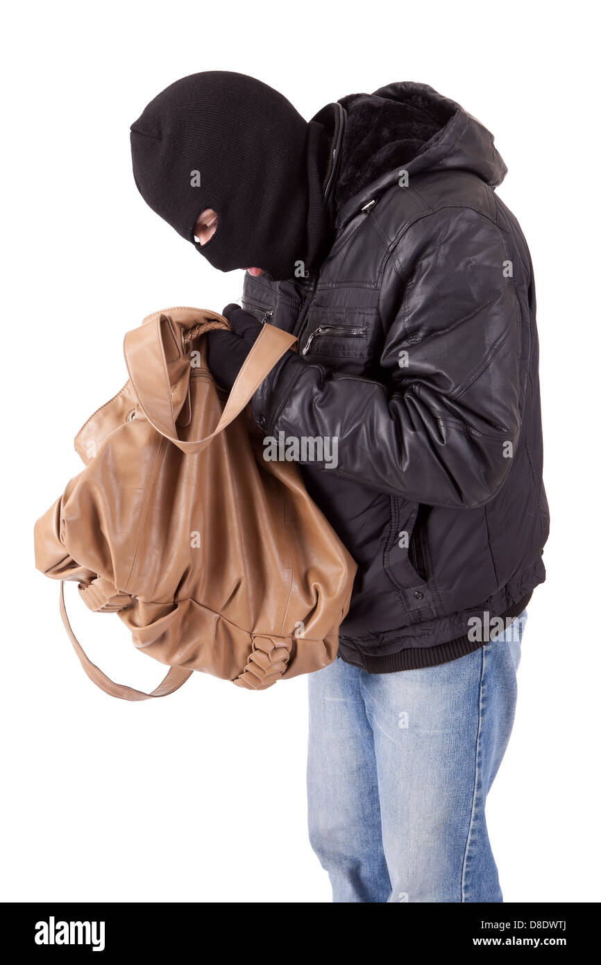 Thief, stealing a purse, isolated over white Stock Photo