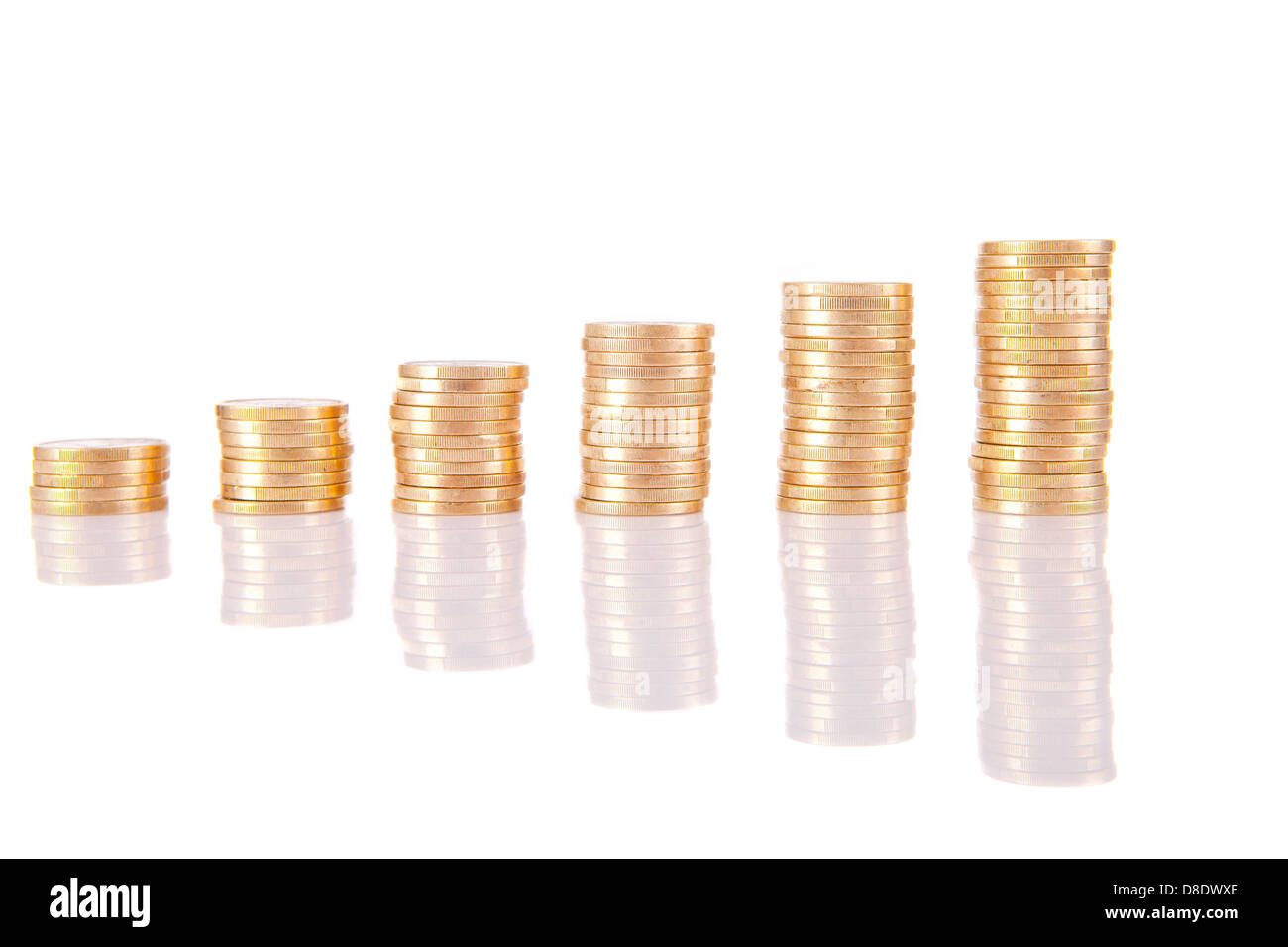 Pile of coins with reflection Stock Photo - Alamy