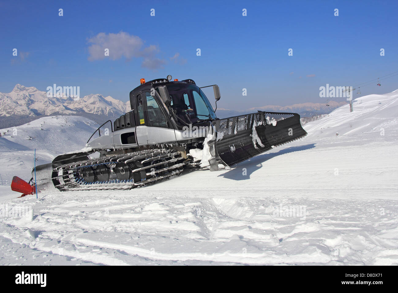 Snow groomer on a skiing slope, Vogel in Slovenia Stock Photo