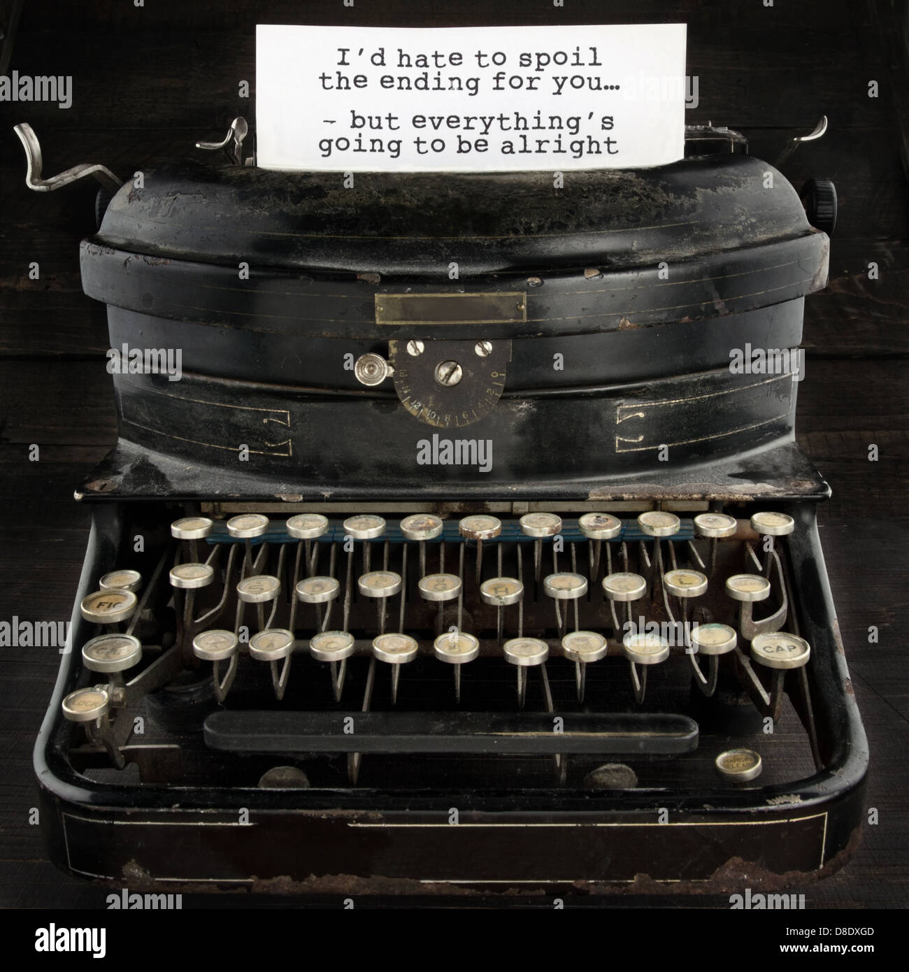 Old black antique vintage typewriter with inspirational quote Stock