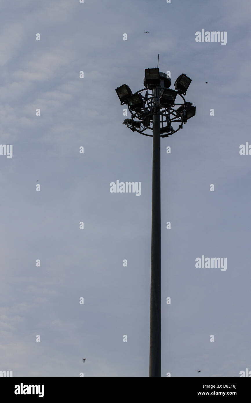 triple layer floodlight that against blue sky Stock Photo