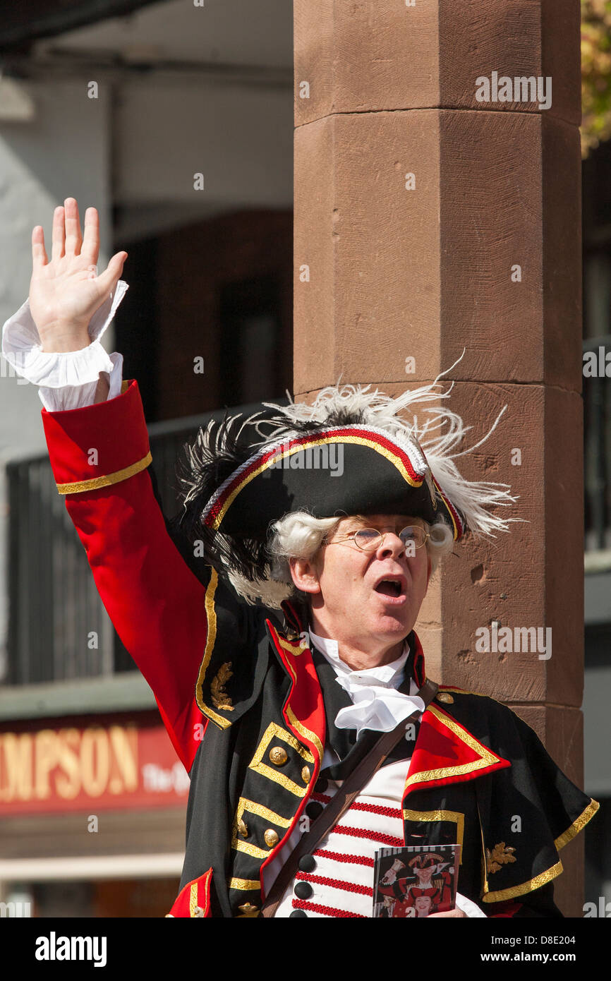 Chester town crier David Mitchell makes his midday pronouncements at the Chester cross every day