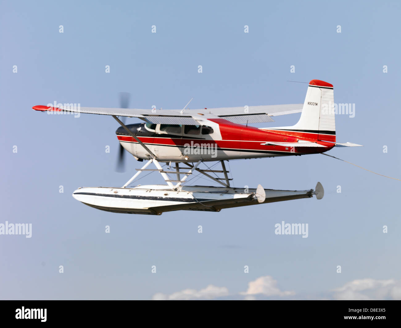 Cessna 185 on floats flying out of lake Hood Seaplane Base in Stock ...