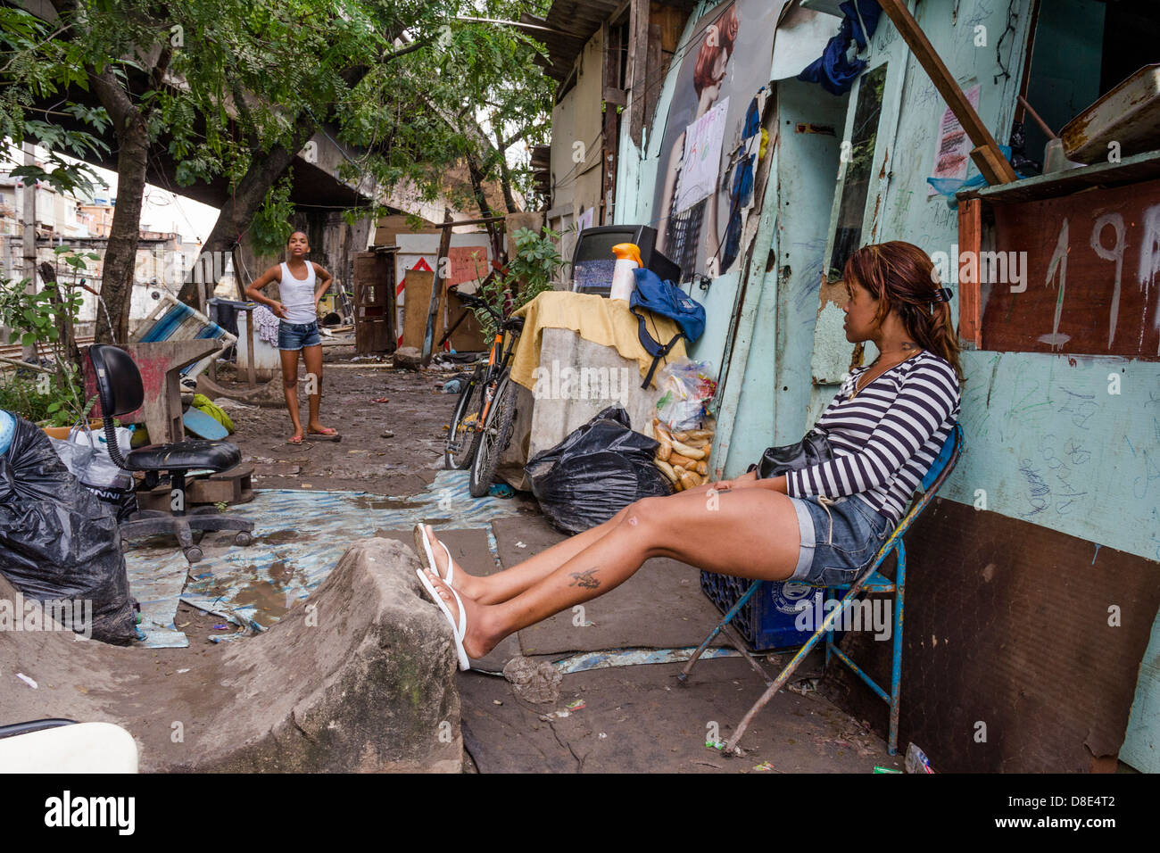 Woman and child in slum built margins railroad, north of Rio de Janeiro Stock Photo