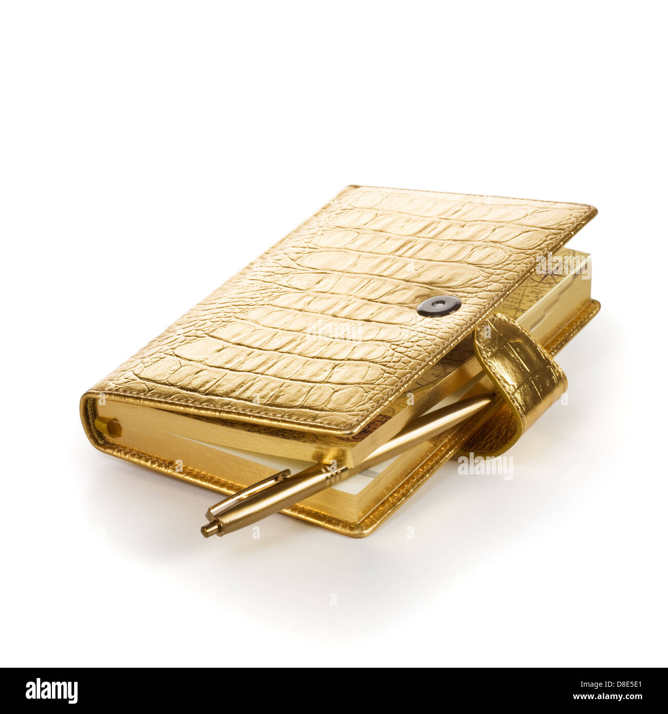 Luxury golden leather notebook with pen on white background Stock Photo