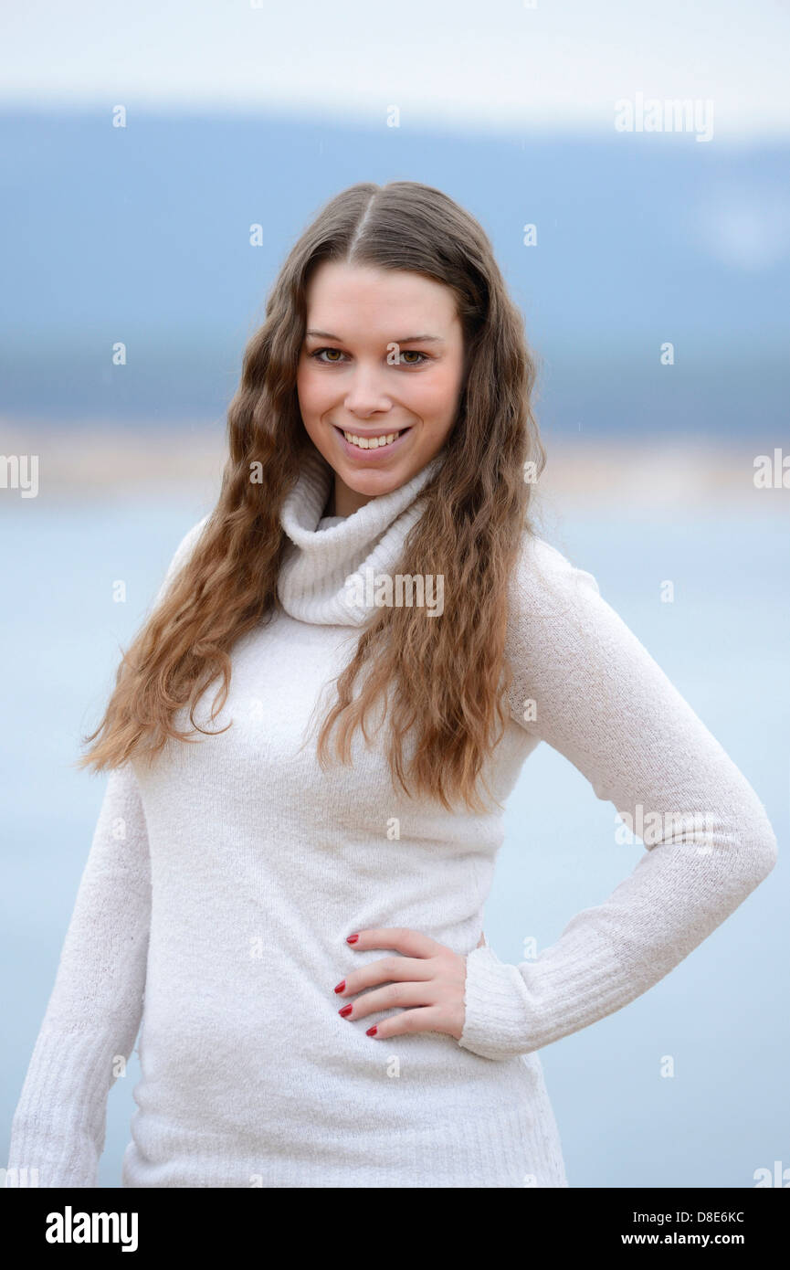 Young woman dark hair shoulders hi-res stock photography and images - Alamy