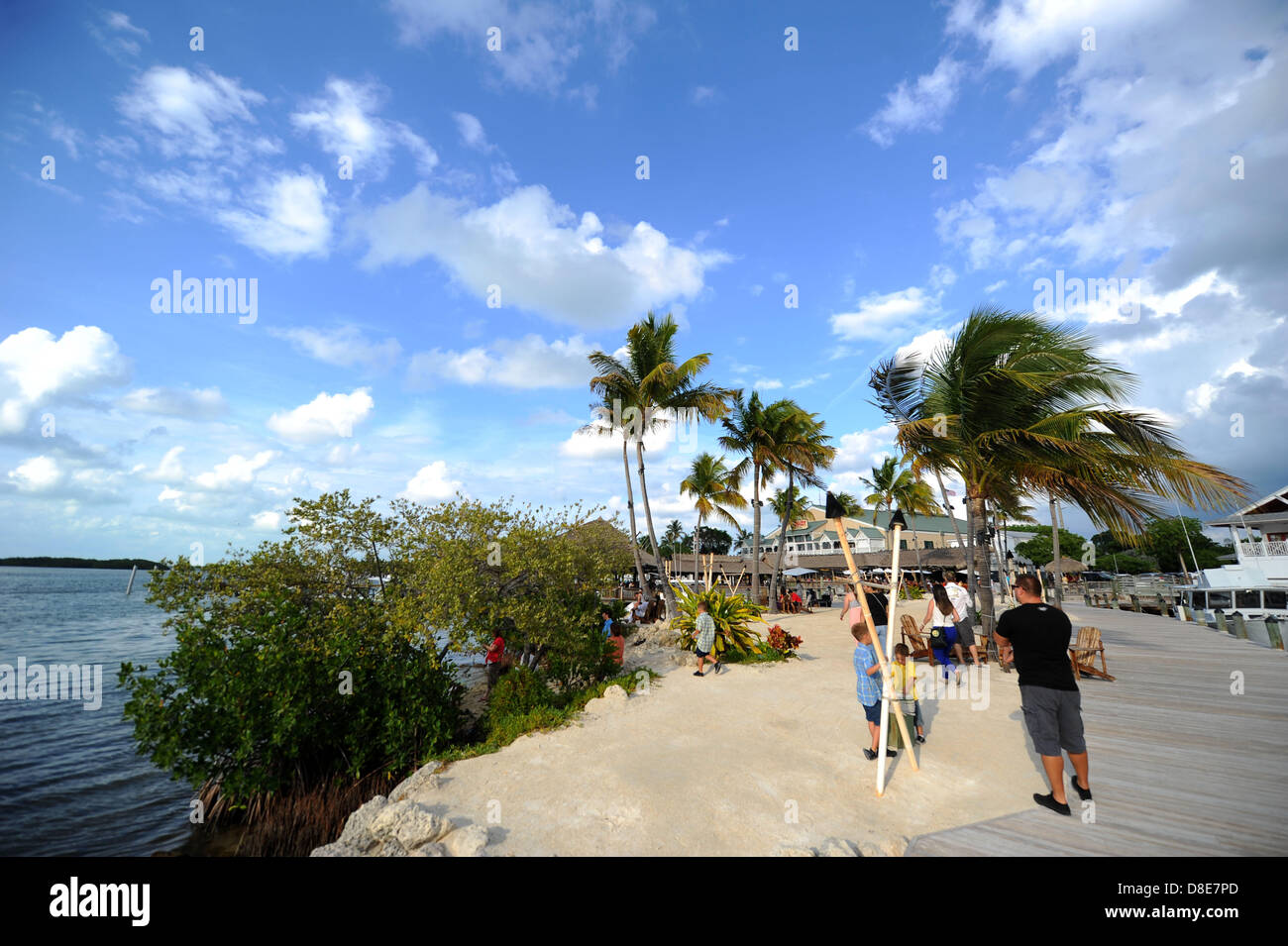 Tourists relax at a beach esplanade at Florida Keys in Islamorada