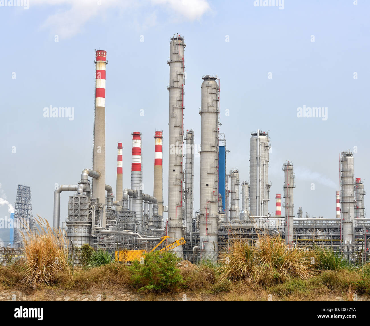 Industrial landscape with chimneys tank Stock Photo