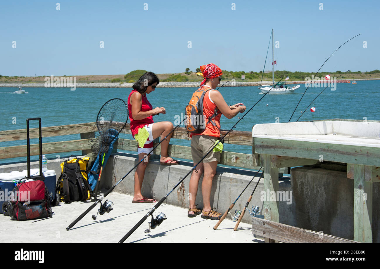 Women fishing at Cocoa Beach Florida USA Stock Photo Alamy