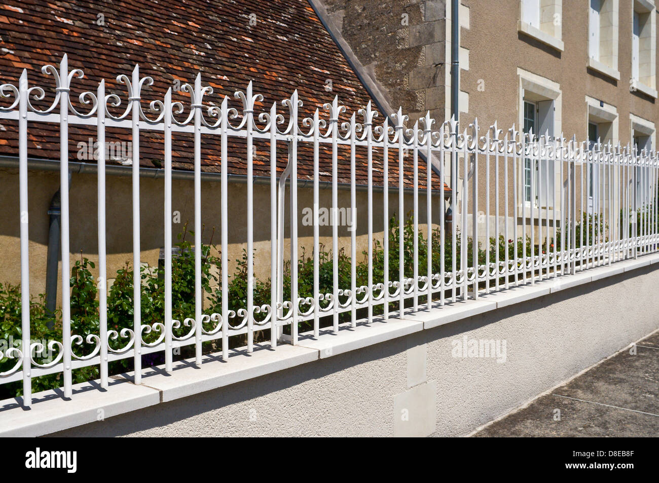 New, freshly painted iron garden railings - France. Stock Photo