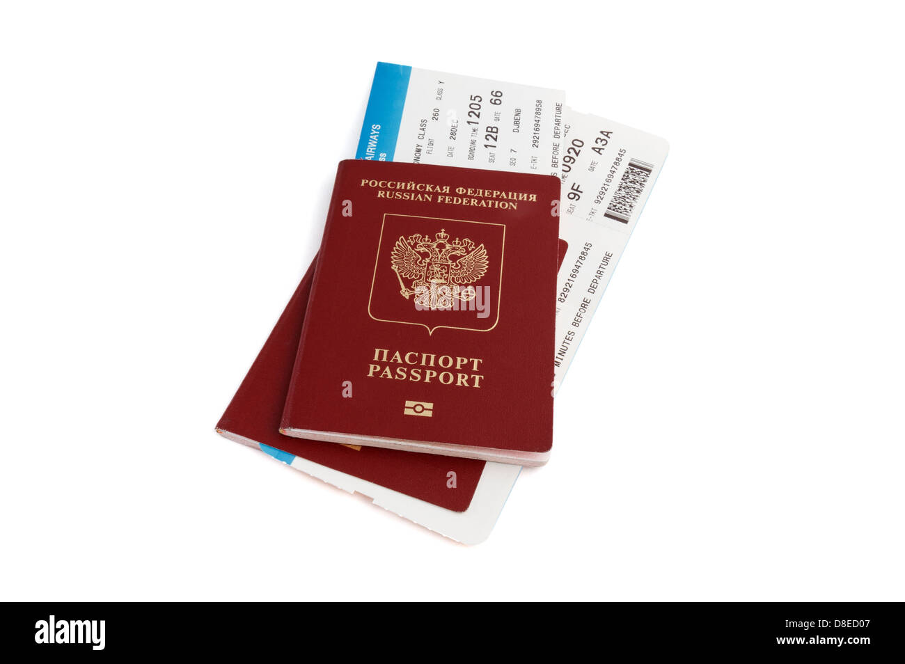 Two isolated Russian passports with boarding passes with clipping path Stock Photo