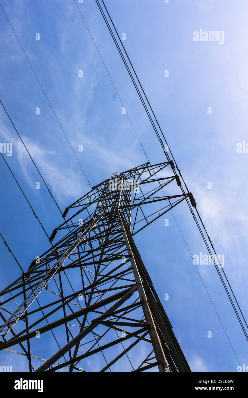 Electric high voltage tower with sky background Stock Photo - Alamy