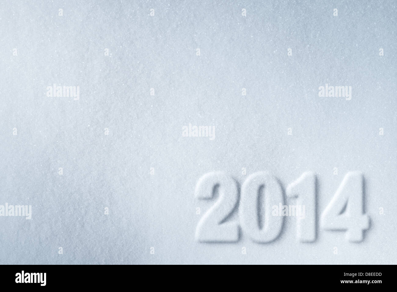 2014 new year symbol printed on snow background Stock Photo