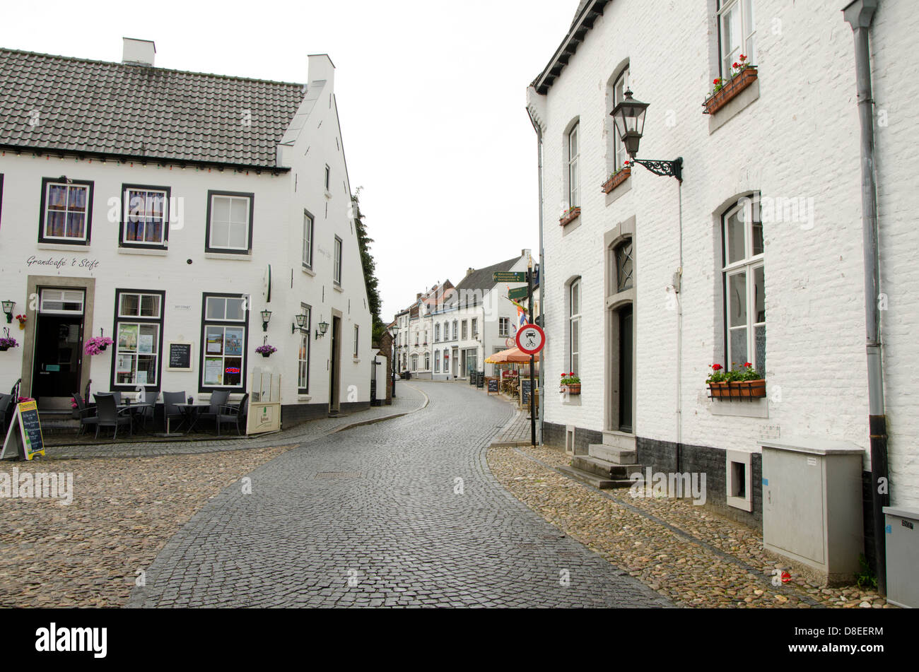Whitewashed brick houses in the Hofstraat in Thorn, a medieval town in