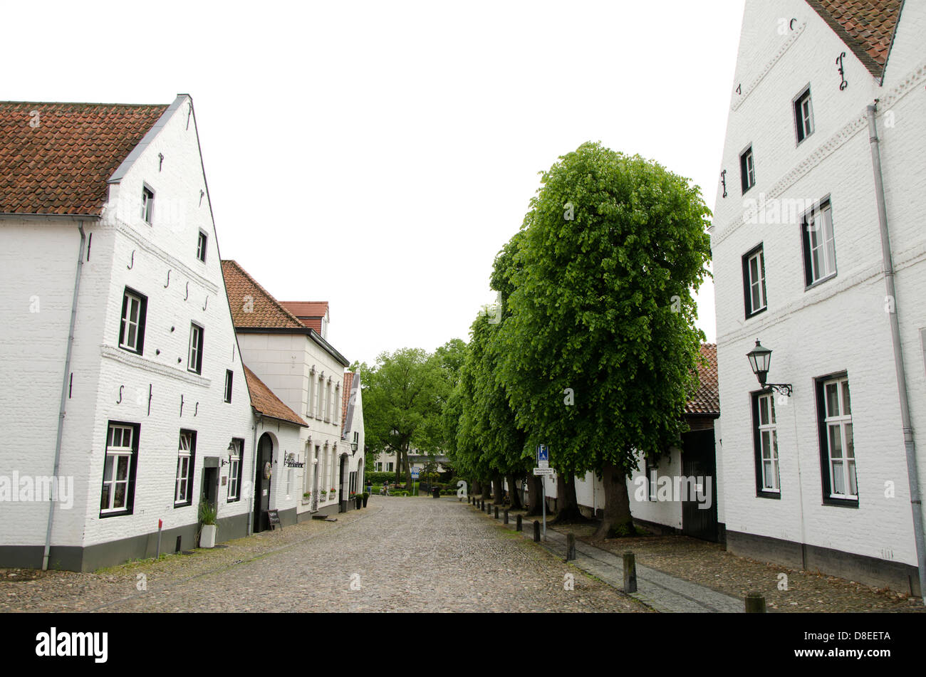Whitewashed brick houses in the Hofstraat in Thorn, a medieval town in