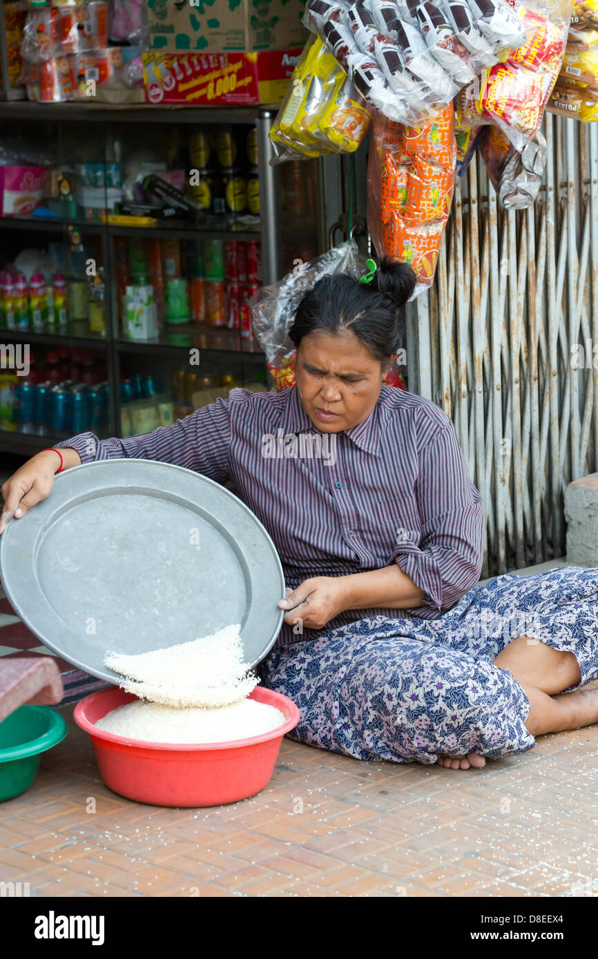 People Selling Rice Woman selling Rice in the Street in Phnom Penh, Cambodia Stock Photo ...